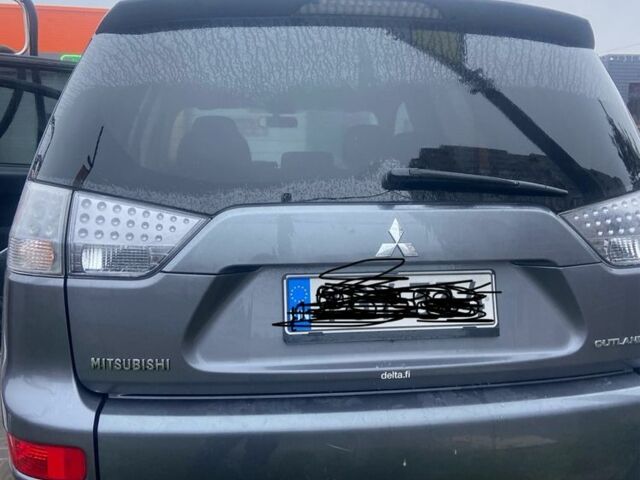 Сірий Міцубісі Аутлендер, об'ємом двигуна 2 л та пробігом 330 тис. км за 4950 $, фото 1 на Automoto.ua