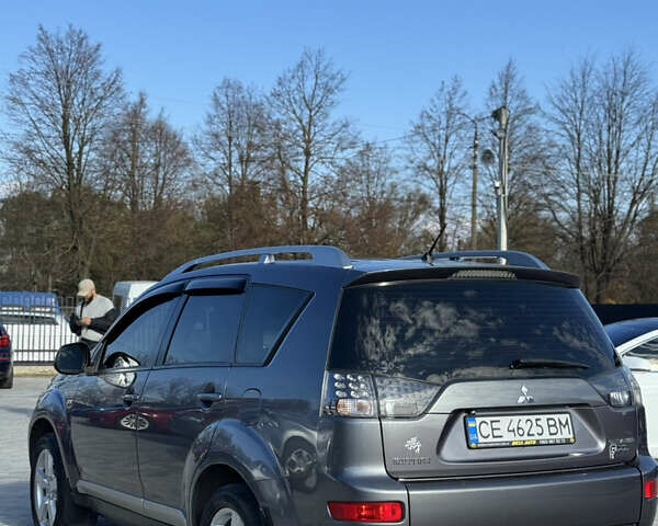 Серый Мицубиси Аутлендер, объемом двигателя 2.36 л и пробегом 215 тыс. км за 8000 $, фото 5 на Automoto.ua