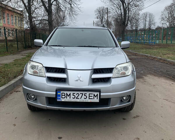Серый Мицубиси Аутлендер, объемом двигателя 2 л и пробегом 247 тыс. км за 5999 $, фото 10 на Automoto.ua