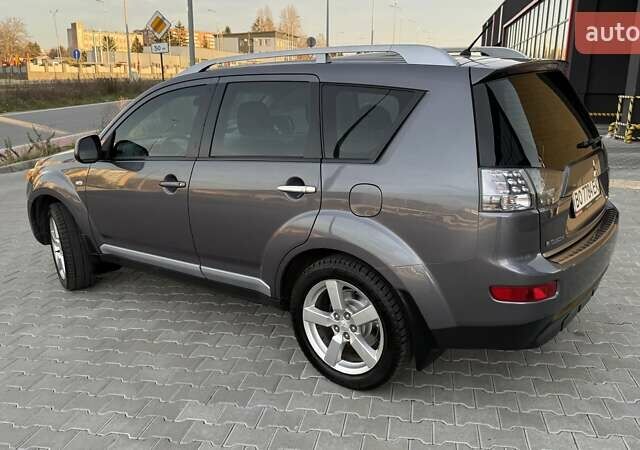 Серый Мицубиси Аутлендер, объемом двигателя 2.4 л и пробегом 174 тыс. км за 9599 $, фото 4 на Automoto.ua