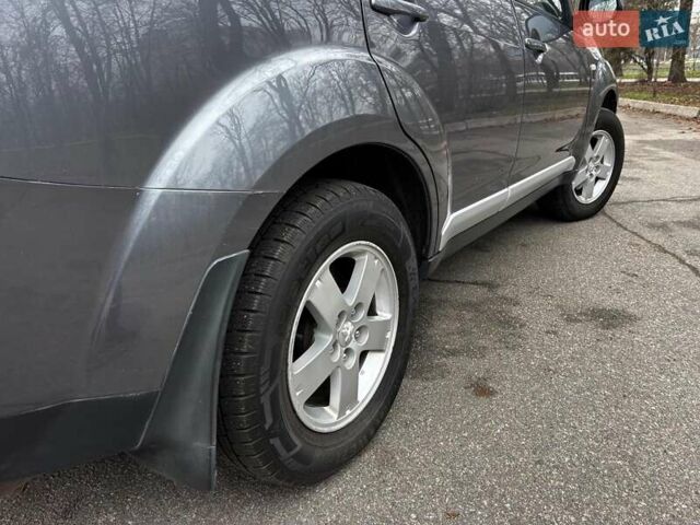 Серый Мицубиси Аутлендер, объемом двигателя 2.4 л и пробегом 237 тыс. км за 8490 $, фото 10 на Automoto.ua
