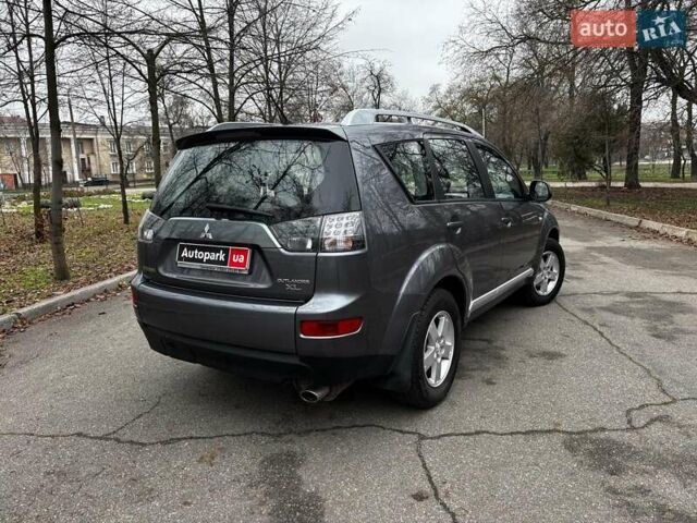 Серый Мицубиси Аутлендер, объемом двигателя 2.4 л и пробегом 237 тыс. км за 8490 $, фото 6 на Automoto.ua