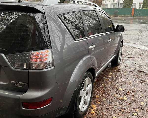 Сірий Міцубісі Аутлендер, об'ємом двигуна 3 л та пробігом 209 тис. км за 9800 $, фото 16 на Automoto.ua