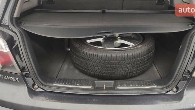 Серый Мицубиси Аутлендер, объемом двигателя 2 л и пробегом 200 тыс. км за 5999 $, фото 30 на Automoto.ua