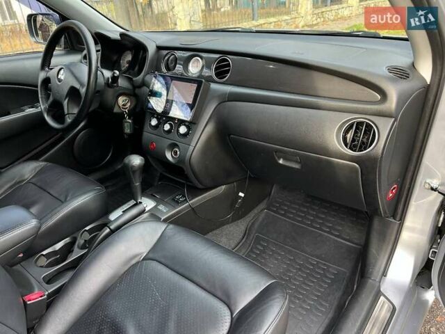 Серый Мицубиси Аутлендер, объемом двигателя 2.38 л и пробегом 170 тыс. км за 6900 $, фото 17 на Automoto.ua