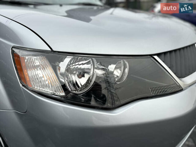 Серый Мицубиси Аутлендер, объемом двигателя 2.4 л и пробегом 61 тыс. км за 11300 $, фото 18 на Automoto.ua