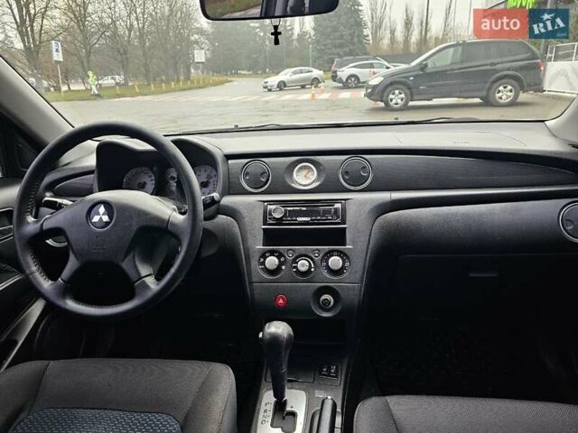 Сірий Міцубісі Аутлендер, об'ємом двигуна 2.38 л та пробігом 230 тис. км за 5700 $, фото 21 на Automoto.ua