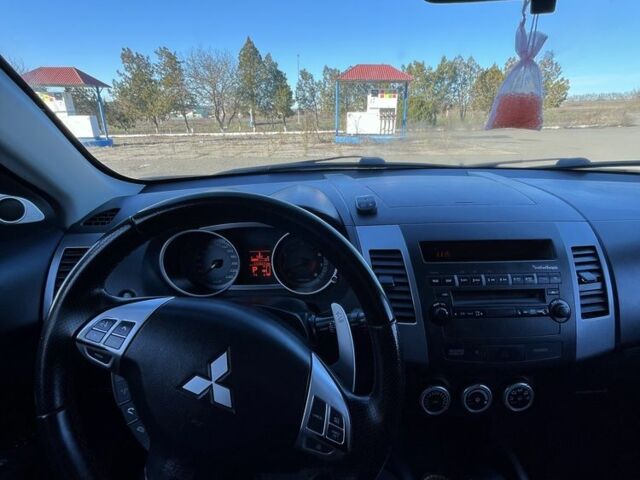 Серый Мицубиси Аутлендер, объемом двигателя 2.4 л и пробегом 213 тыс. км за 7800 $, фото 7 на Automoto.ua