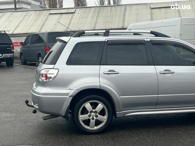 Серый Мицубиси Аутлендер, объемом двигателя 2.4 л и пробегом 324 тыс. км за 6890 $, фото 11 на Automoto.ua