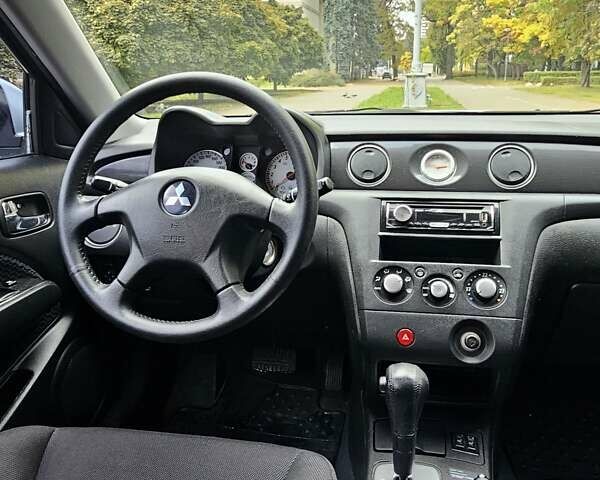 Мицубиси Аутлендер 2008 в Киеве на Automoto.ua Серый Мицубиси Аутлендер, объемом двигателя 2.38 л и пробегом 200 тыс. км за 5900 $, фото 21 на Automoto.ua