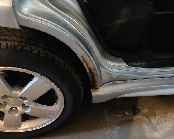 Серый Мицубиси Аутлендер, объемом двигателя 2.38 л и пробегом 323 тыс. км за 6800 $, фото 26 на Automoto.ua