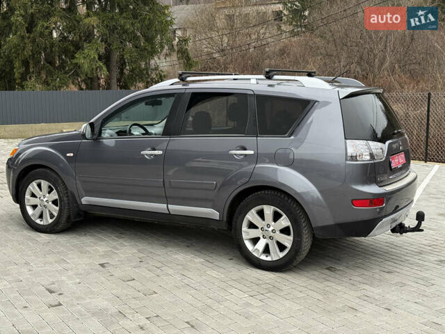 Сірий Міцубісі Аутлендер, об'ємом двигуна 2 л та пробігом 237 тис. км за 8999 $, фото 24 на Automoto.ua