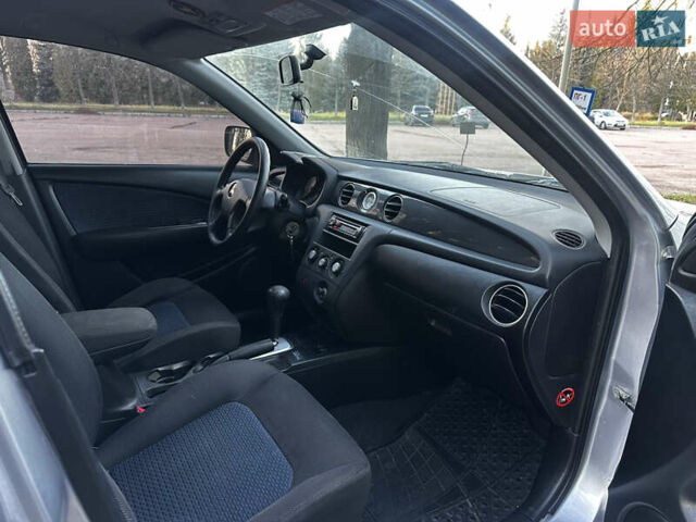 Серый Мицубиси Аутлендер, объемом двигателя 2.4 л и пробегом 320 тыс. км за 6000 $, фото 16 на Automoto.ua