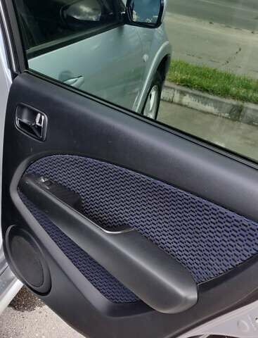 Серый Мицубиси Аутлендер, объемом двигателя 2.38 л и пробегом 323 тыс. км за 6800 $, фото 12 на Automoto.ua