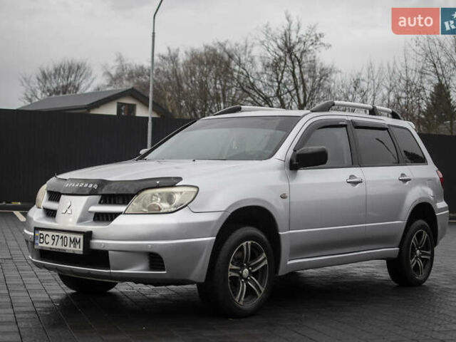 Сірий Міцубісі Аутлендер, об'ємом двигуна 2 л та пробігом 258 тис. км за 5650 $, фото 3 на Automoto.ua