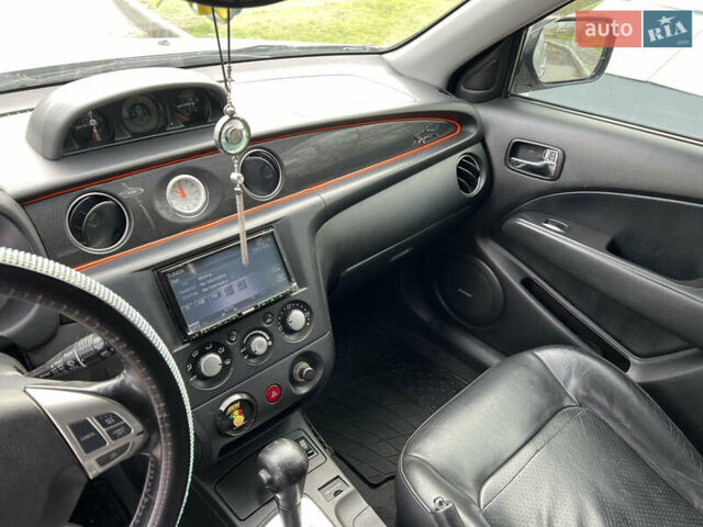 Серый Мицубиси Аутлендер, объемом двигателя 2.38 л и пробегом 197 тыс. км за 7699 $, фото 7 на Automoto.ua