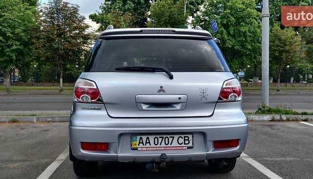 Серый Мицубиси Аутлендер, объемом двигателя 2.38 л и пробегом 323 тыс. км за 6800 $, фото 17 на Automoto.ua