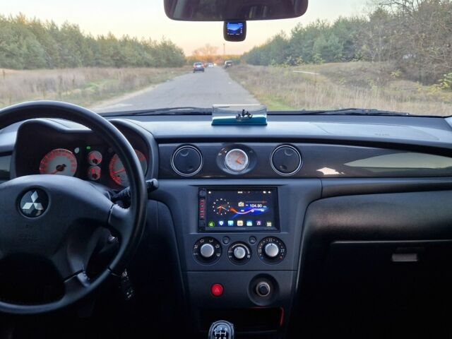 Міцубісі Аутлендер 2008 у Кременчуге на Automoto.ua Сірий Міцубісі Аутлендер, об'ємом двигуна 2 л та пробігом 157 тис. км за 8300 $, фото 13 на Automoto.ua