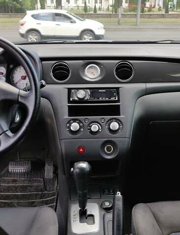 Серый Мицубиси Аутлендер, объемом двигателя 2.38 л и пробегом 323 тыс. км за 6800 $, фото 6 на Automoto.ua