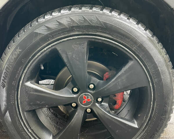 Серый Мицубиси Аутлендер, объемом двигателя 2.01 л и пробегом 345 тыс. км за 8100 $, фото 7 на Automoto.ua