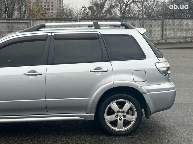 Серый Мицубиси Аутлендер, объемом двигателя 2.4 л и пробегом 324 тыс. км за 6890 $, фото 5 на Automoto.ua