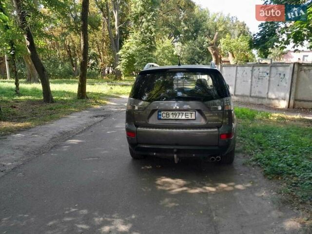 Серый Мицубиси Аутлендер, объемом двигателя 2.2 л и пробегом 208 тыс. км за 9300 $, фото 6 на Automoto.ua