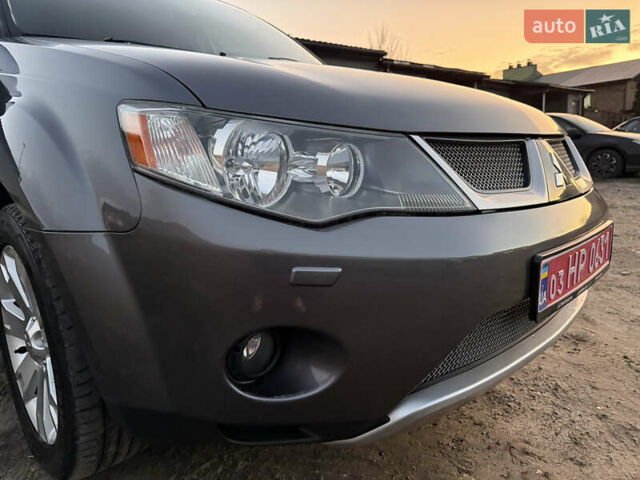 Сірий Міцубісі Аутлендер, об'ємом двигуна 2 л та пробігом 235 тис. км за 8950 $, фото 68 на Automoto.ua