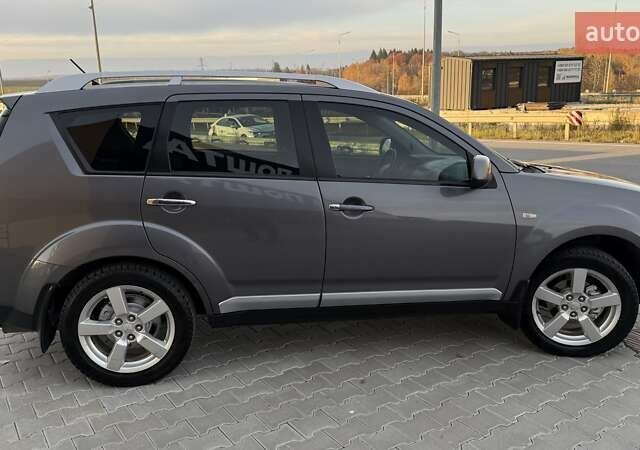 Серый Мицубиси Аутлендер, объемом двигателя 2.4 л и пробегом 174 тыс. км за 9599 $, фото 8 на Automoto.ua