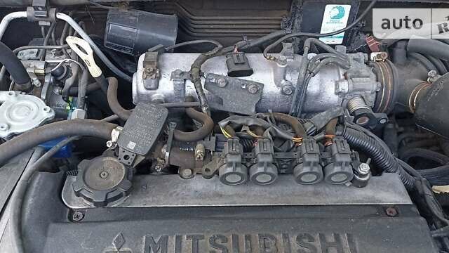 Сірий Міцубісі Аутлендер, об'ємом двигуна 2 л та пробігом 225 тис. км за 6900 $, фото 39 на Automoto.ua