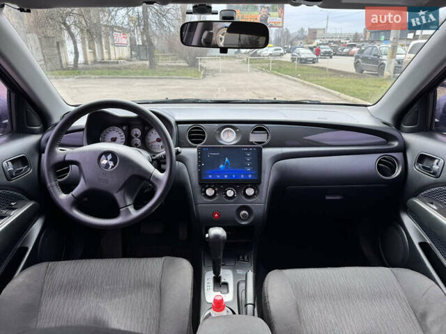 Серый Мицубиси Аутлендер, объемом двигателя 2.38 л и пробегом 254 тыс. км за 7300 $, фото 20 на Automoto.ua