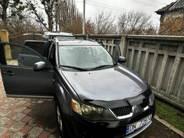 Сірий Міцубісі Аутлендер, об'ємом двигуна 2.4 л та пробігом 265 тис. км за 7000 $, фото 1 на Automoto.ua