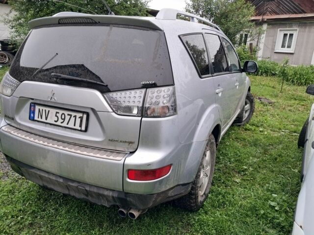 Сірий Міцубісі Аутлендер, об'ємом двигуна 2 л та пробігом 263 тис. км за 4000 $, фото 2 на Automoto.ua