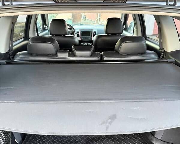 Серый Мицубиси Аутлендер, объемом двигателя 2.18 л и пробегом 287 тыс. км за 10200 $, фото 16 на Automoto.ua