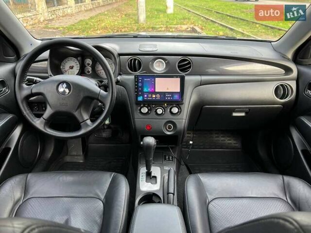 Серый Мицубиси Аутлендер, объемом двигателя 2.38 л и пробегом 170 тыс. км за 6900 $, фото 13 на Automoto.ua