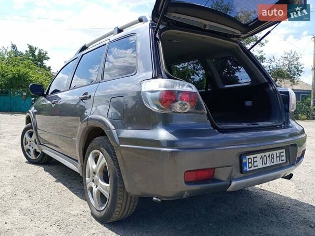 Серый Мицубиси Аутлендер, объемом двигателя 2.35 л и пробегом 342 тыс. км за 6900 $, фото 5 на Automoto.ua