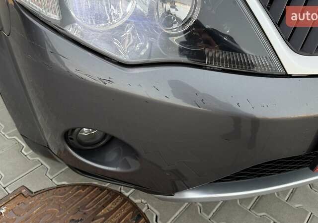 Серый Мицубиси Аутлендер, объемом двигателя 2.4 л и пробегом 174 тыс. км за 9599 $, фото 25 на Automoto.ua