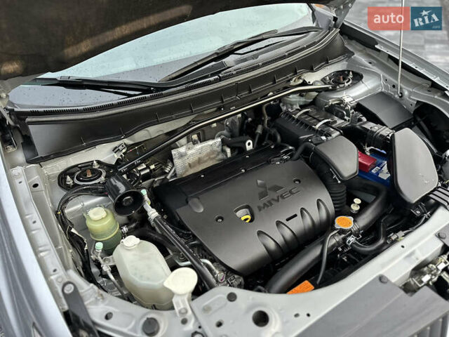 Серый Мицубиси Аутлендер, объемом двигателя 2.4 л и пробегом 61 тыс. км за 11300 $, фото 59 на Automoto.ua
