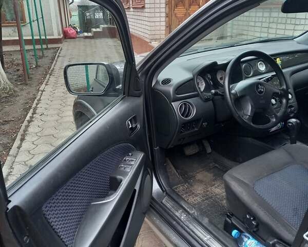 Серый Мицубиси Аутлендер, объемом двигателя 2.38 л и пробегом 143 тыс. км за 7300 $, фото 15 на Automoto.ua