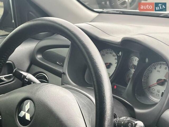 Серый Мицубиси Аутлендер, объемом двигателя 2.4 л и пробегом 324 тыс. км за 6890 $, фото 19 на Automoto.ua