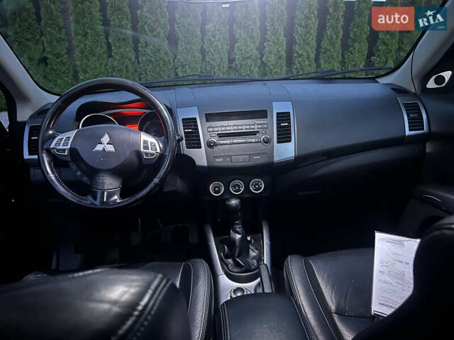 Серый Мицубиси Аутлендер, объемом двигателя 2 л и пробегом 235 тыс. км за 9000 $, фото 9 на Automoto.ua
