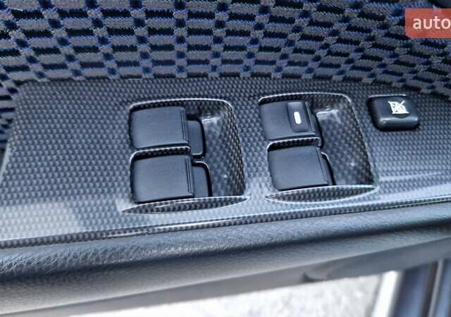 Серый Мицубиси Аутлендер, объемом двигателя 2 л и пробегом 157 тыс. км за 8300 $, фото 25 на Automoto.ua