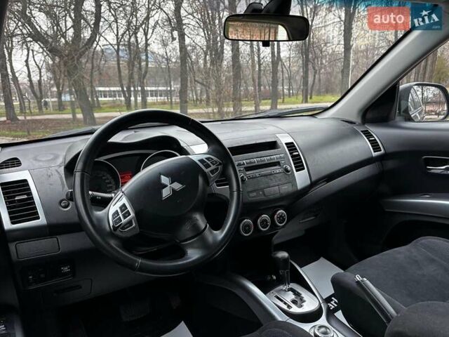 Серый Мицубиси Аутлендер, объемом двигателя 2.4 л и пробегом 237 тыс. км за 8490 $, фото 15 на Automoto.ua
