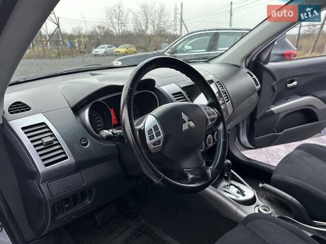Серый Мицубиси Аутлендер, объемом двигателя 2.4 л и пробегом 61 тыс. км за 11300 $, фото 32 на Automoto.ua