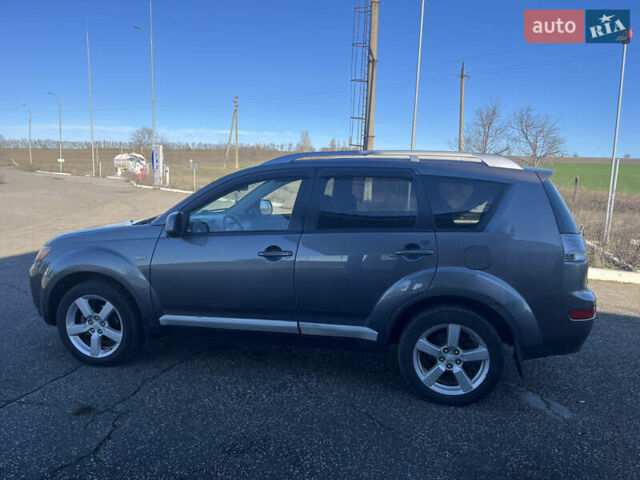Сірий Міцубісі Аутлендер, об'ємом двигуна 2.36 л та пробігом 214 тис. км за 7800 $, фото 6 на Automoto.ua