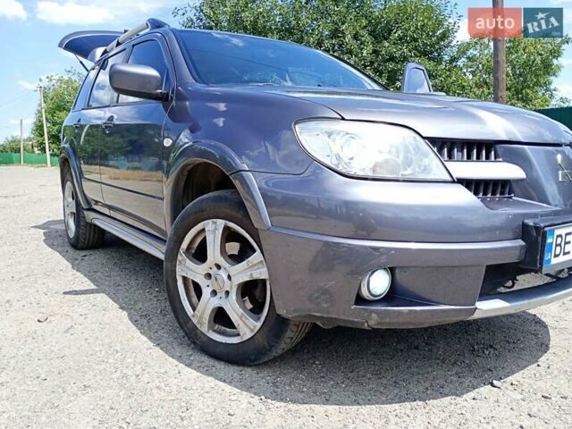 Серый Мицубиси Аутлендер, объемом двигателя 2.35 л и пробегом 342 тыс. км за 6900 $, фото 17 на Automoto.ua