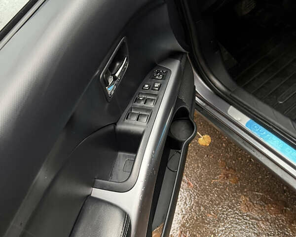 Сірий Міцубісі Аутлендер, об'ємом двигуна 3 л та пробігом 209 тис. км за 9800 $, фото 20 на Automoto.ua