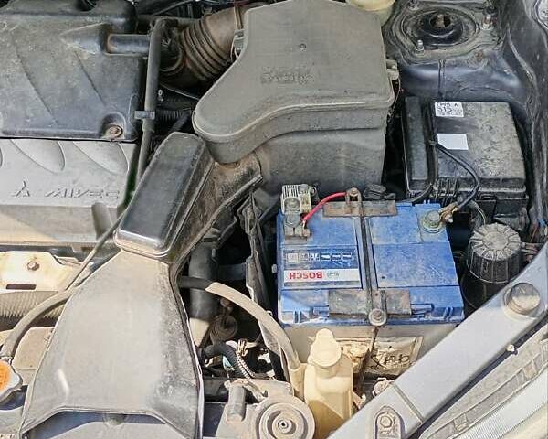 Серый Мицубиси Аутлендер, объемом двигателя 2.35 л и пробегом 342 тыс. км за 6900 $, фото 11 на Automoto.ua