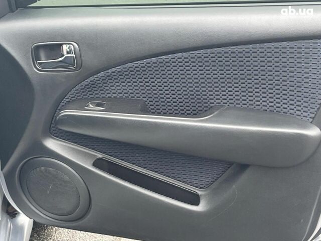 Серый Мицубиси Аутлендер, объемом двигателя 2.4 л и пробегом 324 тыс. км за 6890 $, фото 13 на Automoto.ua