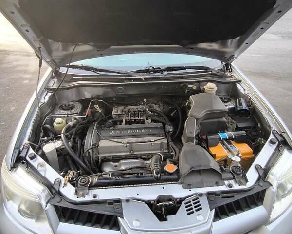 Сірий Міцубісі Аутлендер, об'ємом двигуна 2 л та пробігом 161 тис. км за 7500 $, фото 14 на Automoto.ua