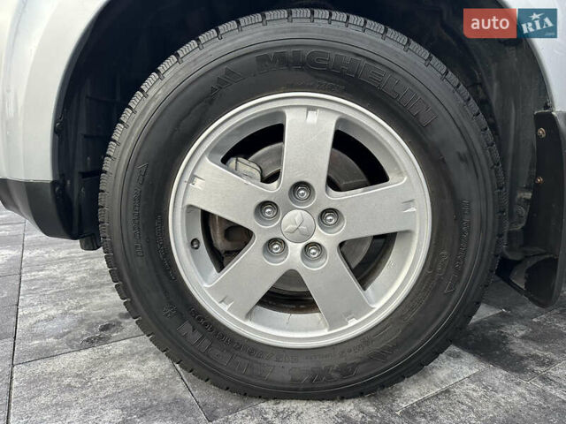 Серый Мицубиси Аутлендер, объемом двигателя 2.4 л и пробегом 61 тыс. км за 11300 $, фото 66 на Automoto.ua